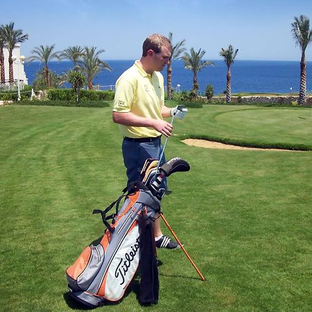 Stella Di Mare Beach Hotel & Spa Шарм-еш-Шейх Екстер'єр фото Golf player with a golf bag