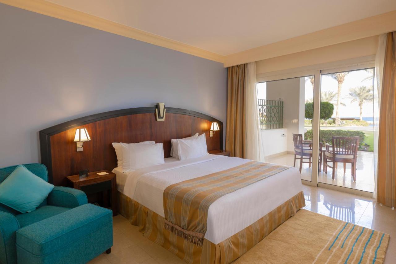 Stella Di Mare Beach Hotel & Spa Шарм-еш-Шейх Екстер'єр фото A bedroom in a hotel
